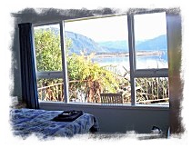 Bedroom 1 has a double bed and great views of the lake.